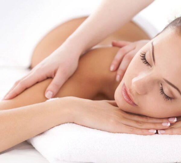Client receiving a Swedish back massage