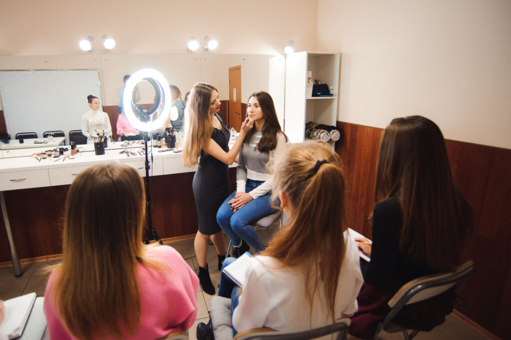 Make-up tutor training students in a classroom