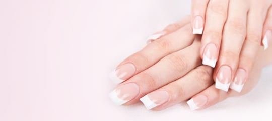 Natural acrylic nail extensions with a French finish